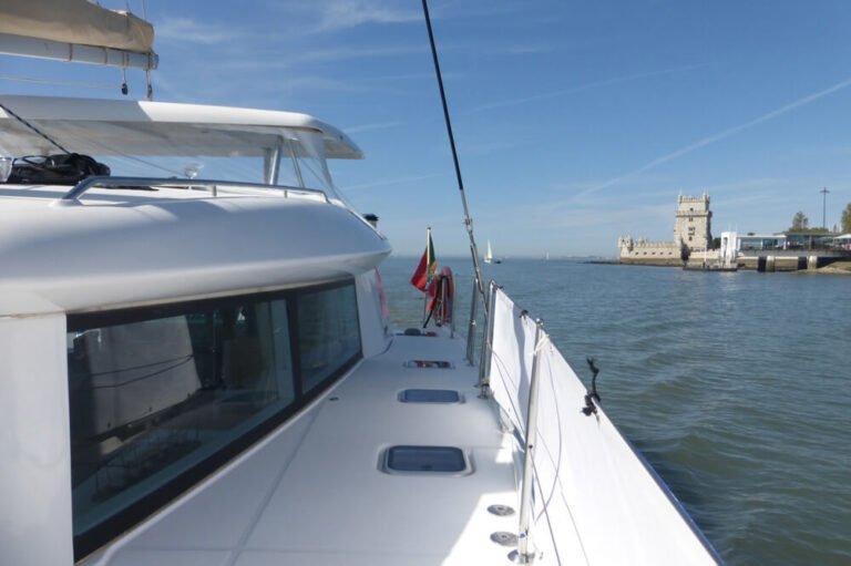 Perspective from a catamaran with Belém Tower in the background