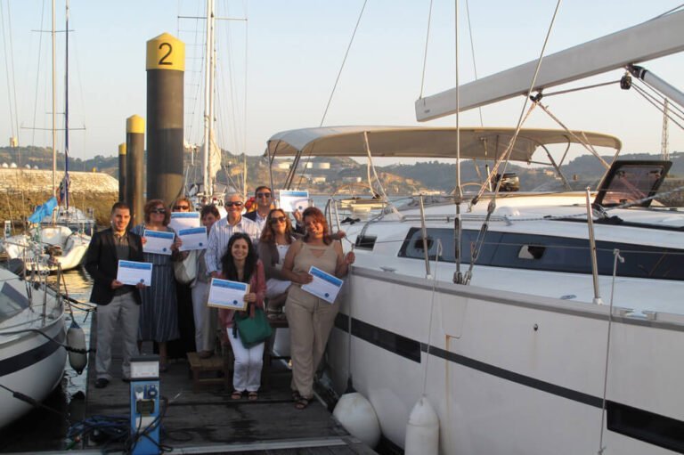 Group of people from the US Embassy at the end of a sailboat tour