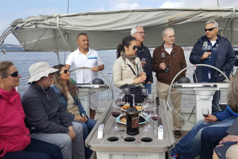 Tour guide presenting Lisbon during a boat tour