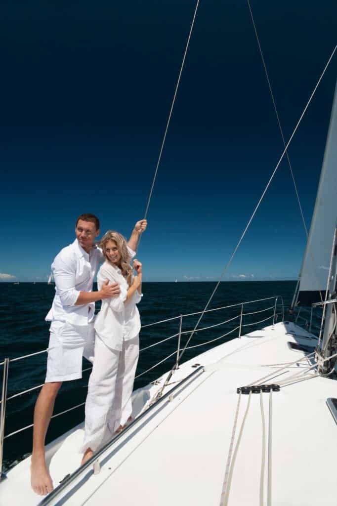 Couple enjoying a sailboat ride