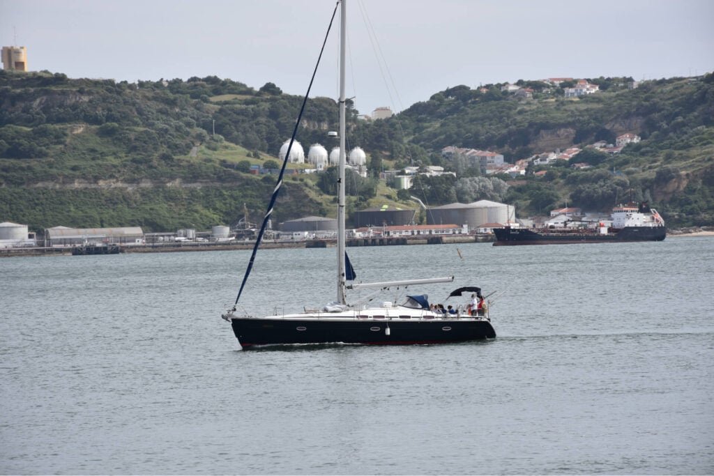 Contemplating the views during the sailboat tour with guests on board