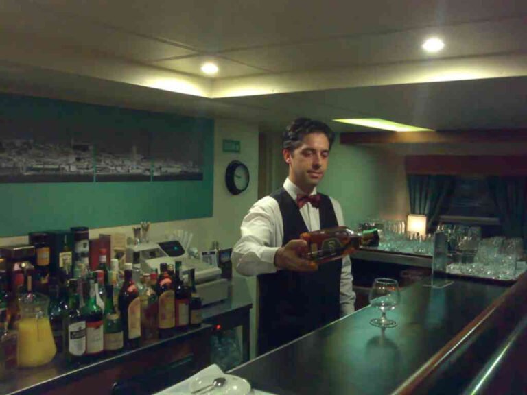 Bartender on the ship serving drinks