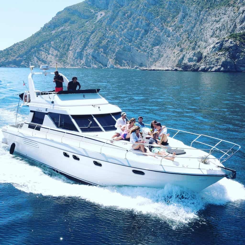 Group of friends enjoying their boat tour