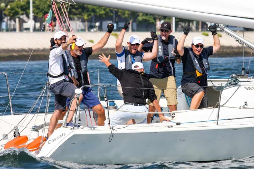 Celebrating excellent teamwork during a regatta on the Tagus River