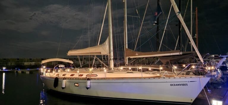 Illuminated sailboat docked at the Cascais Marina