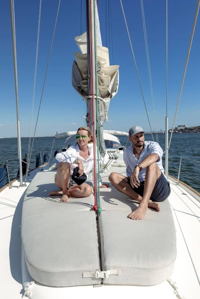 Enjoying the views and the good weather with a sailboat ride on the Tagus River