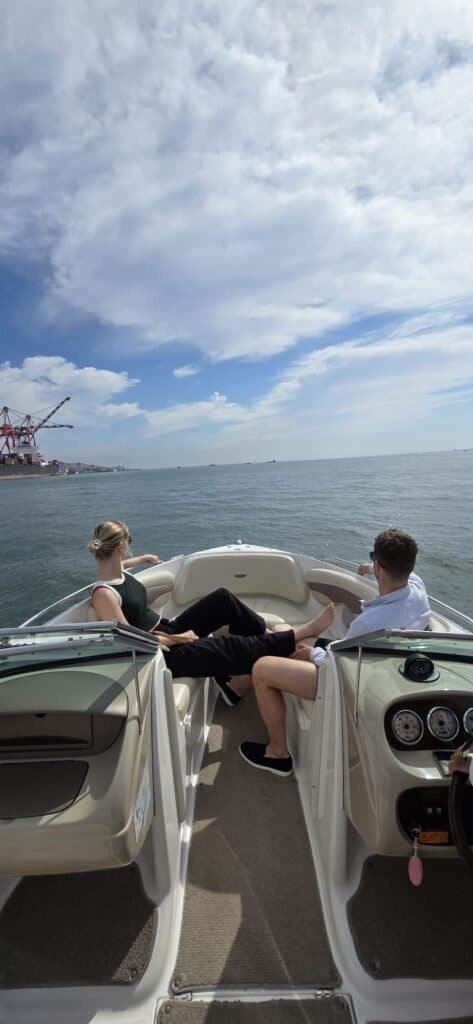 Crew members aboard this marvelous speedboat, sailing peacefully through Lisbon's waters. An exclusive experience with unique views of the city of Lisbon.