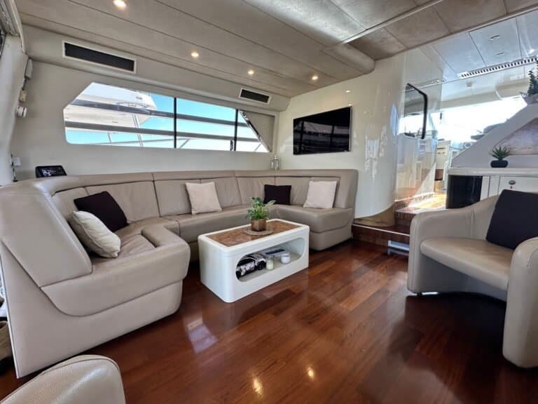 The indoor salon features leather sofas, fine wood, and plenty of natural light – a fusion of comfort and sophistication.