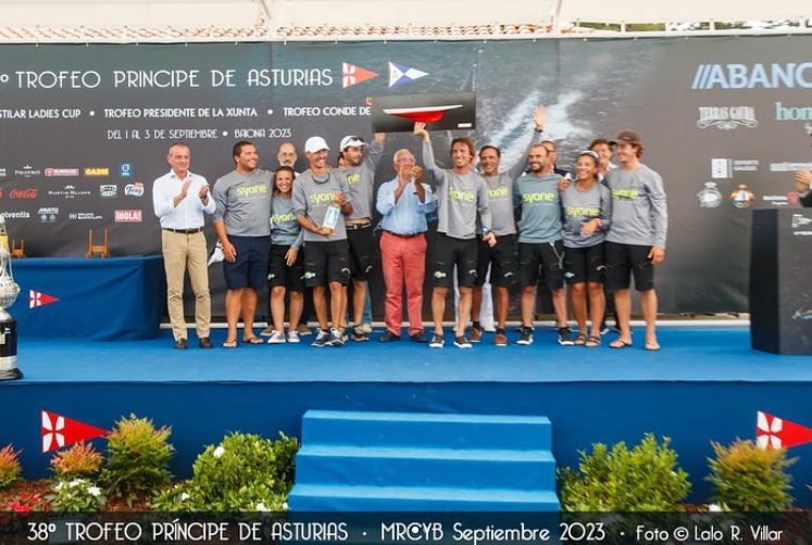 Formal moment of recognition, celebrating a good result at this prestigious event