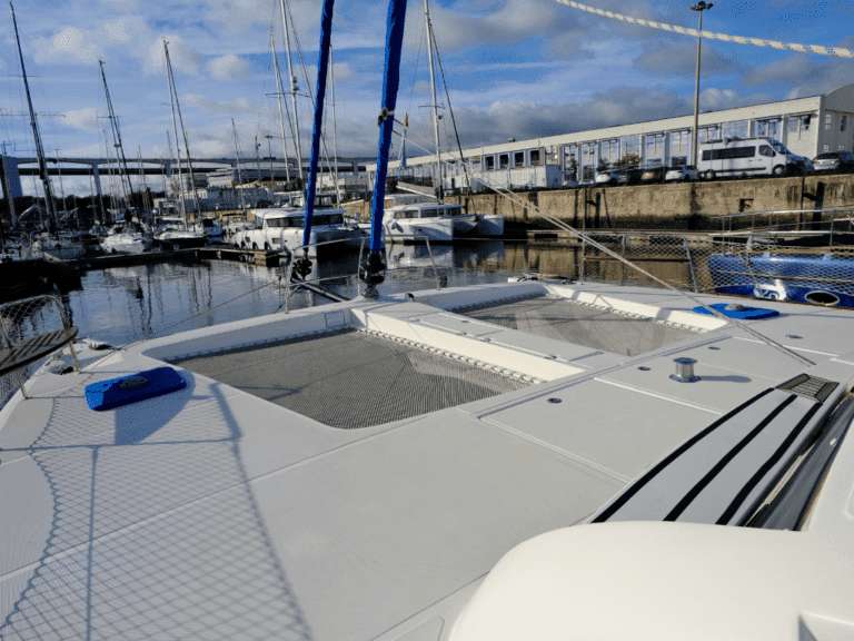 Net and solarium area at the bow of the Seabar catamaran in Lisbon.